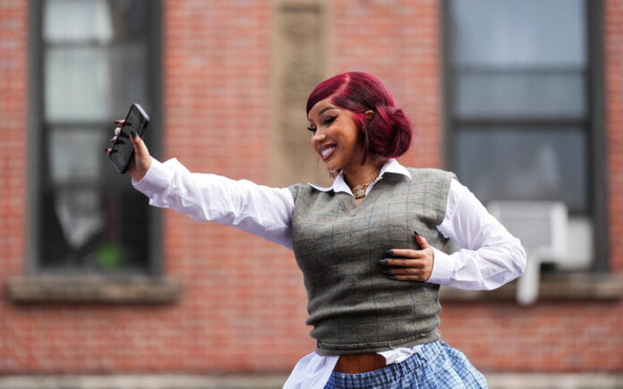 Rapper Cardi B holds pop-up event at bodega in Washington Heights